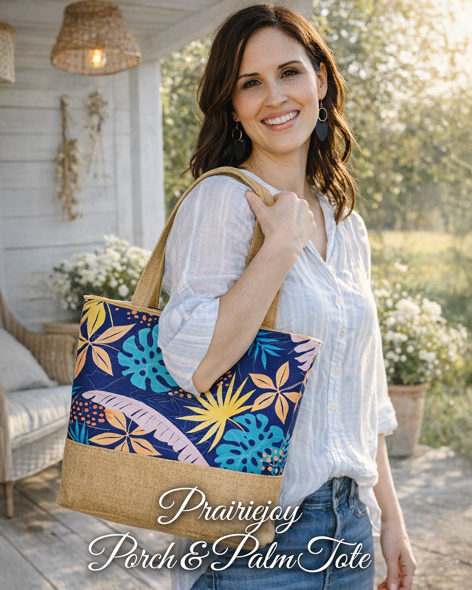 Woman carrying Prairiejoy Porch & Palm Tote Bag with colorful botanical print on a farmhouse porch