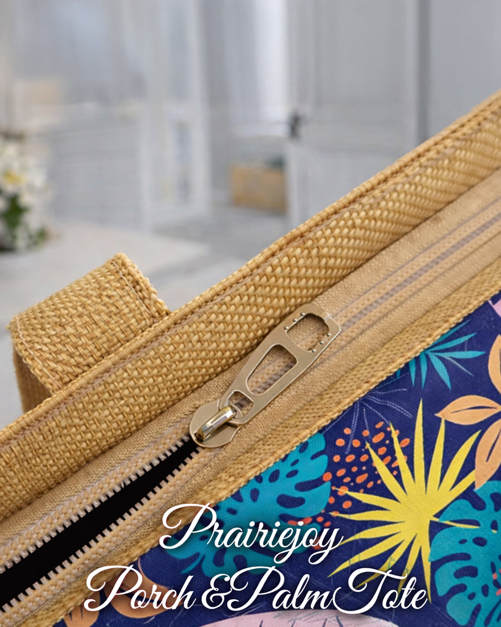 Close-up of Prairiejoy Porch & Palm Tote Bag zip-top closure and woven-look strap detail