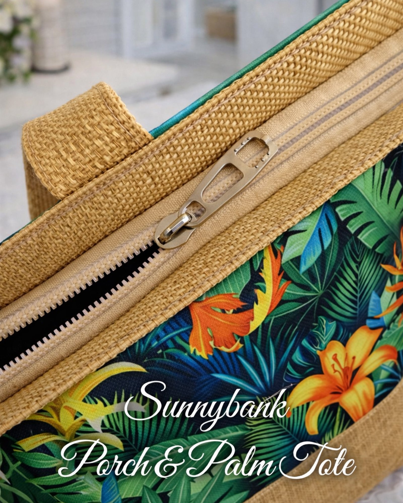 Close-up of Sunnybank Porch & Palm Tote Bag zip-top closure and woven-look strap detail